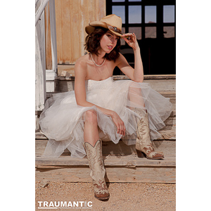Another photo session from the class I took recently.  This one featured cowgirl brides that we photographed around an old west church set.