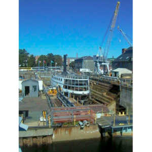 A boat under construction in drydock