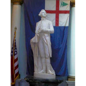 A marble statue of a revolutionary war figure
