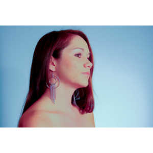 My 'niece' Lindsey Mueller.  This was our first time shooting together and she was looking for shots to use for a music single she was working on.