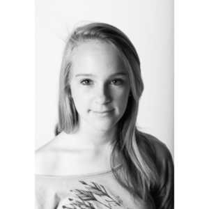 The third year shooting these images.  There were a ton of fun images of the kids this year and the graphic artist made some rather unexciting image choices.  The images of Nathan Klima illustrate this clearly.  I made the Star Wars image of him from one of his excellent jumping poses.  Compared to his mile marker, huge difference.