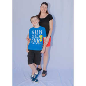 The third year shooting these images.  There were a ton of fun images of the kids this year and the graphic artist made some rather unexciting image choices.  The images of Nathan Klima illustrate this clearly.  I made the Star Wars image of him from one of his excellent jumping poses.  Compared to his mile marker, huge difference.