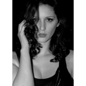 Sometimes you get a chance to shoot with an amazing nude model, and what do you do?  Shoot pictures of her sitting on a chair fully clothed.  She's gorgeous, and I love these shots.