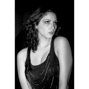 Sometimes you get a chance to shoot with an amazing nude model, and what do you do?  Shoot pictures of her sitting on a chair fully clothed.  She's gorgeous, and I love these shots.