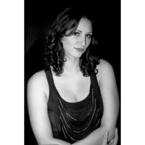 Sometimes you get a chance to shoot with an amazing nude model, and what do you do?  Shoot pictures of her sitting on a chair fully clothed.  She's gorgeous, and I love these shots.