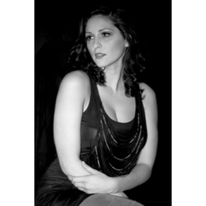 Sometimes you get a chance to shoot with an amazing nude model, and what do you do?  Shoot pictures of her sitting on a chair fully clothed.  She's gorgeous, and I love these shots.