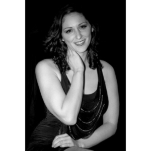 Sometimes you get a chance to shoot with an amazing nude model, and what do you do?  Shoot pictures of her sitting on a chair fully clothed.  She's gorgeous, and I love these shots.