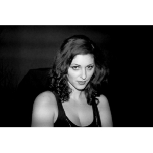 Sometimes you get a chance to shoot with an amazing nude model, and what do you do?  Shoot pictures of her sitting on a chair fully clothed.  She's gorgeous, and I love these shots.