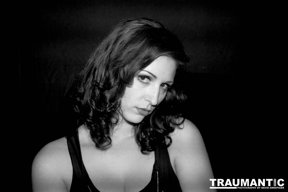 Sometimes you get a chance to shoot with an amazing nude model, and what do you do?  Shoot pictures of her sitting on a chair fully clothed.  She's gorgeous, and I love these shots.