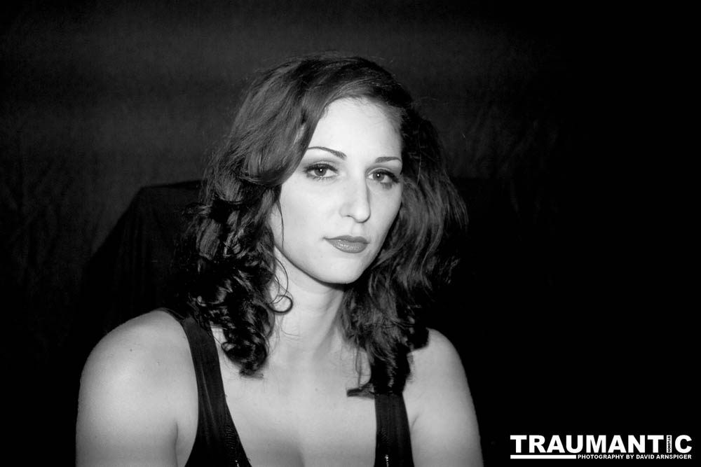 Sometimes you get a chance to shoot with an amazing nude model, and what do you do?  Shoot pictures of her sitting on a chair fully clothed.  She's gorgeous, and I love these shots.