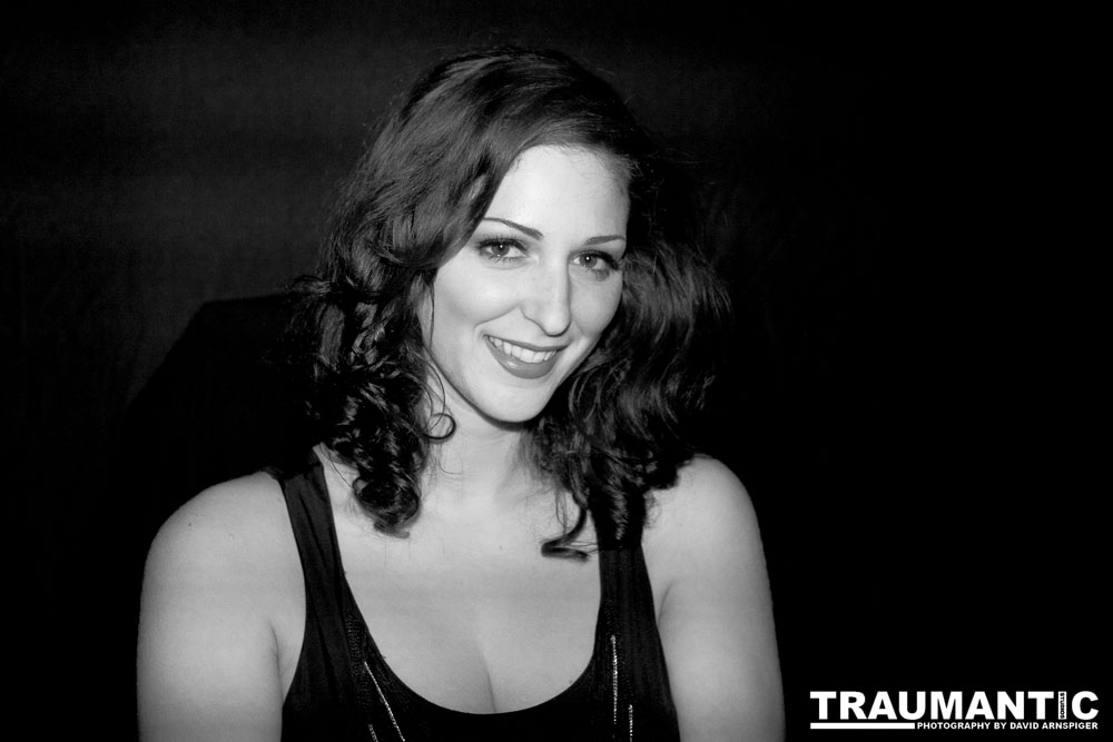 Sometimes you get a chance to shoot with an amazing nude model, and what do you do?  Shoot pictures of her sitting on a chair fully clothed.  She's gorgeous, and I love these shots.