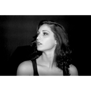 Sometimes you get a chance to shoot with an amazing nude model, and what do you do?  Shoot pictures of her sitting on a chair fully clothed.  She's gorgeous, and I love these shots.