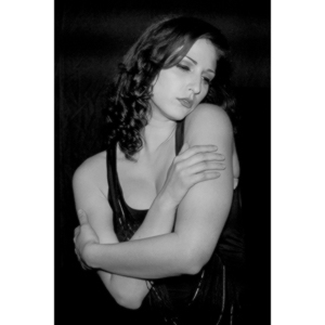 Sometimes you get a chance to shoot with an amazing nude model, and what do you do?  Shoot pictures of her sitting on a chair fully clothed.  She's gorgeous, and I love these shots.