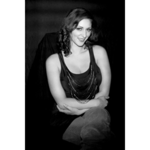 Sometimes you get a chance to shoot with an amazing nude model, and what do you do?  Shoot pictures of her sitting on a chair fully clothed.  She's gorgeous, and I love these shots.