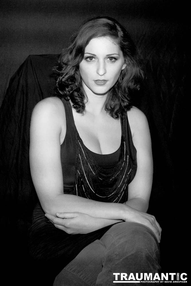 Sometimes you get a chance to shoot with an amazing nude model, and what do you do?  Shoot pictures of her sitting on a chair fully clothed.  She's gorgeous, and I love these shots.