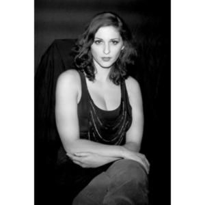 Sometimes you get a chance to shoot with an amazing nude model, and what do you do?  Shoot pictures of her sitting on a chair fully clothed.  She's gorgeous, and I love these shots.