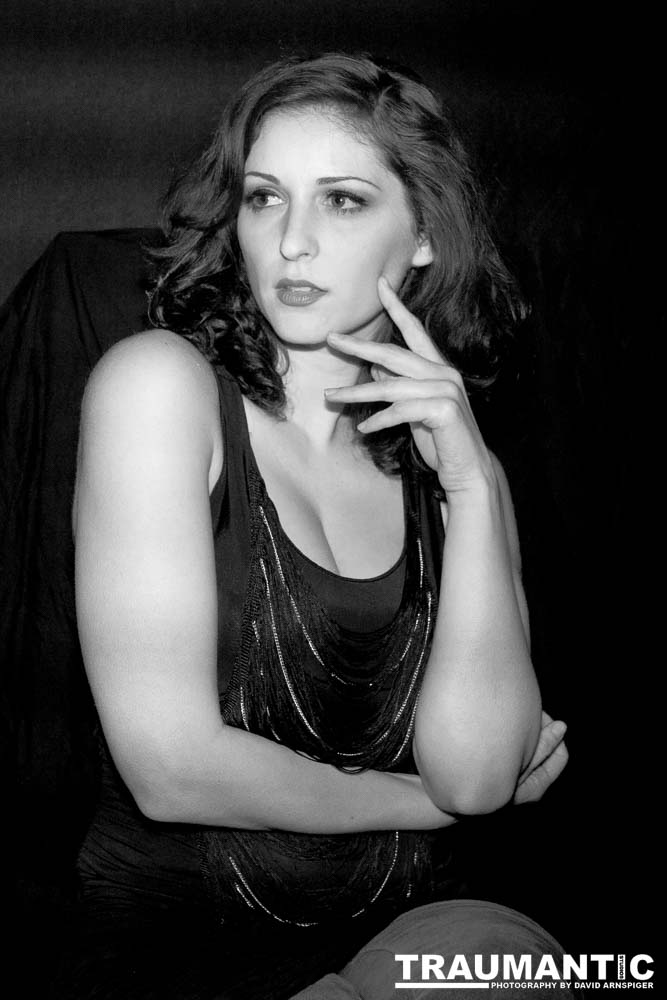 Sometimes you get a chance to shoot with an amazing nude model, and what do you do?  Shoot pictures of her sitting on a chair fully clothed.  She's gorgeous, and I love these shots.