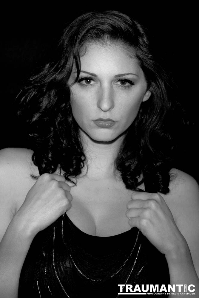 Sometimes you get a chance to shoot with an amazing nude model, and what do you do?  Shoot pictures of her sitting on a chair fully clothed.  She's gorgeous, and I love these shots.