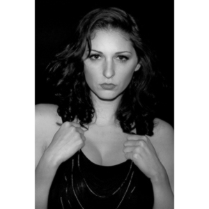 Sometimes you get a chance to shoot with an amazing nude model, and what do you do?  Shoot pictures of her sitting on a chair fully clothed.  She's gorgeous, and I love these shots.