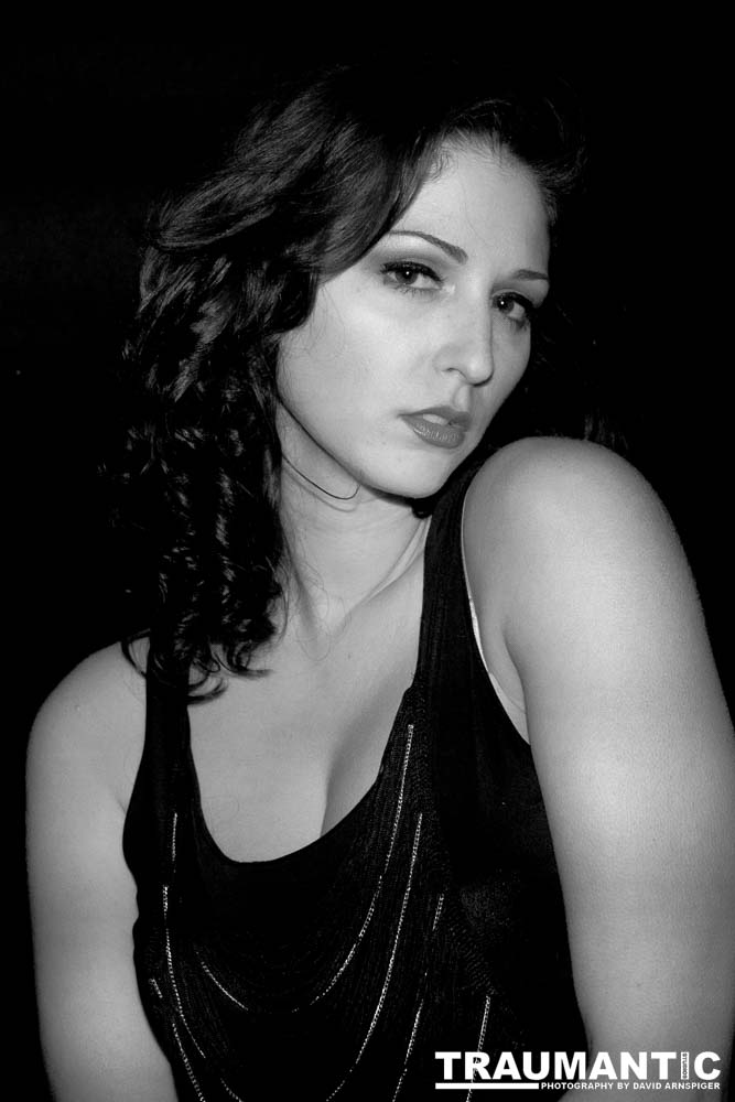 Sometimes you get a chance to shoot with an amazing nude model, and what do you do?  Shoot pictures of her sitting on a chair fully clothed.  She's gorgeous, and I love these shots.