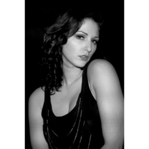 Sometimes you get a chance to shoot with an amazing nude model, and what do you do?  Shoot pictures of her sitting on a chair fully clothed.  She's gorgeous, and I love these shots.