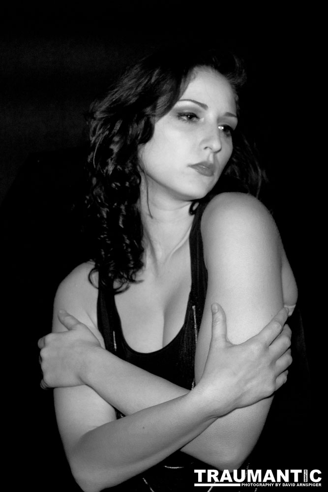 Sometimes you get a chance to shoot with an amazing nude model, and what do you do?  Shoot pictures of her sitting on a chair fully clothed.  She's gorgeous, and I love these shots.