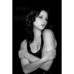 Sometimes you get a chance to shoot with an amazing nude model, and what do you do?  Shoot pictures of her sitting on a chair fully clothed.  She's gorgeous, and I love these shots.