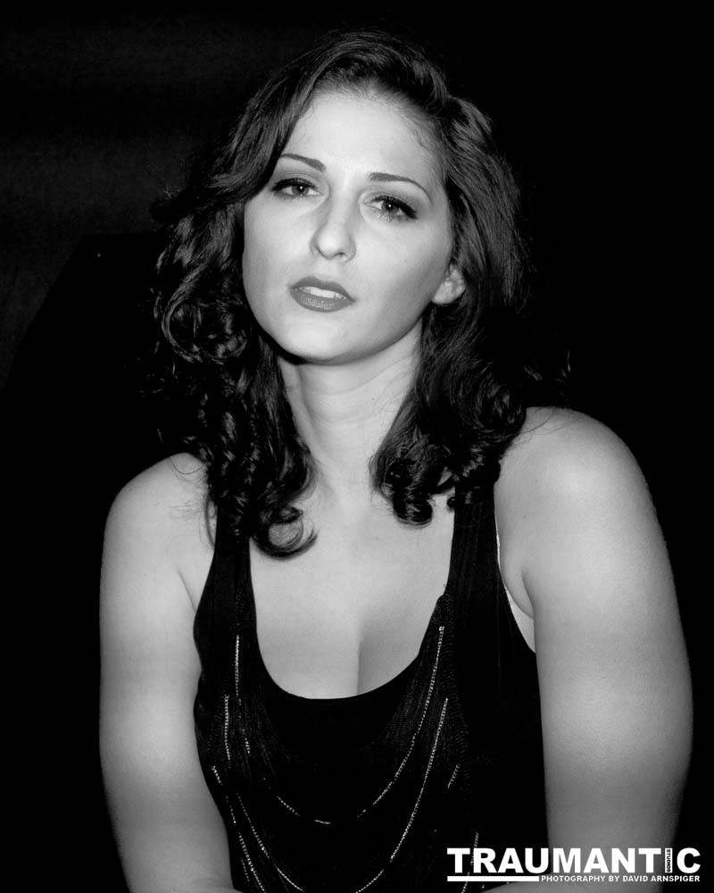 Sometimes you get a chance to shoot with an amazing nude model, and what do you do?  Shoot pictures of her sitting on a chair fully clothed.  She's gorgeous, and I love these shots.