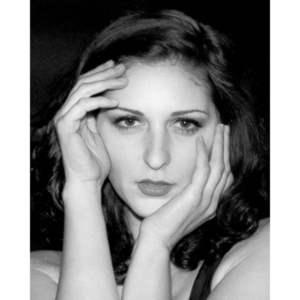 Sometimes you get a chance to shoot with an amazing nude model, and what do you do?  Shoot pictures of her sitting on a chair fully clothed.  She's gorgeous, and I love these shots.