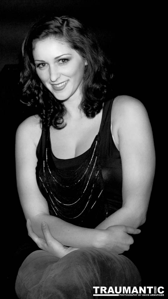 Sometimes you get a chance to shoot with an amazing nude model, and what do you do?  Shoot pictures of her sitting on a chair fully clothed.  She's gorgeous, and I love these shots.