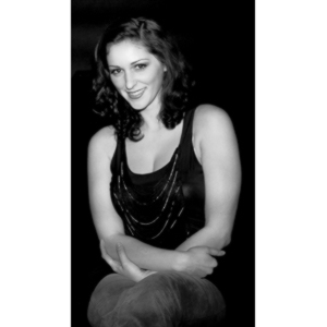 Sometimes you get a chance to shoot with an amazing nude model, and what do you do?  Shoot pictures of her sitting on a chair fully clothed.  She's gorgeous, and I love these shots.