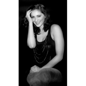 Sometimes you get a chance to shoot with an amazing nude model, and what do you do?  Shoot pictures of her sitting on a chair fully clothed.  She's gorgeous, and I love these shots.