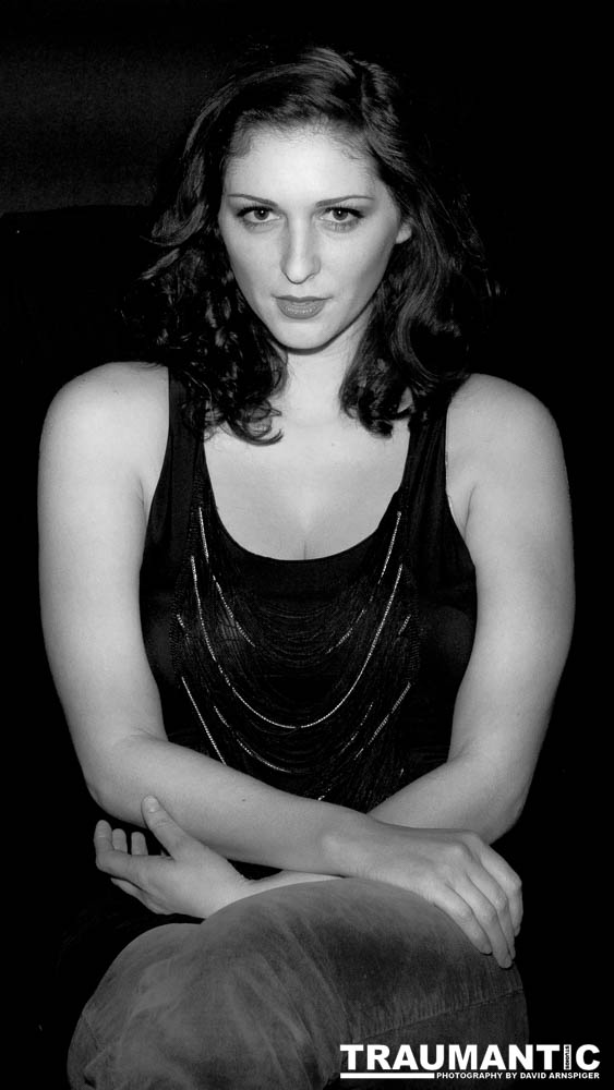 Sometimes you get a chance to shoot with an amazing nude model, and what do you do?  Shoot pictures of her sitting on a chair fully clothed.  She's gorgeous, and I love these shots.