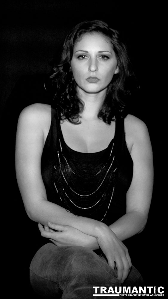 Sometimes you get a chance to shoot with an amazing nude model, and what do you do?  Shoot pictures of her sitting on a chair fully clothed.  She's gorgeous, and I love these shots.