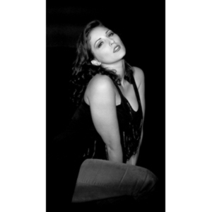 Sometimes you get a chance to shoot with an amazing nude model, and what do you do?  Shoot pictures of her sitting on a chair fully clothed.  She's gorgeous, and I love these shots.