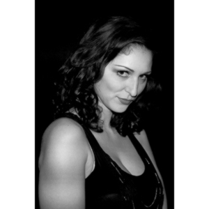 Sometimes you get a chance to shoot with an amazing nude model, and what do you do?  Shoot pictures of her sitting on a chair fully clothed.  She's gorgeous, and I love these shots.