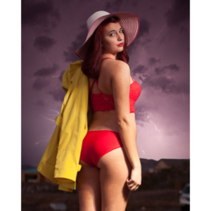 My second shoot with MOnce Gardner.  This was intended to be a pinup shoot in the rain, but the weather and timing simply did not work for us, so we just goofed around in the studio instead.  I think we got some really cute shots of her.  I took a shot of lightning I had shot months before and inserted it behind her.  This is as close to the planned shoot as we got.  I love it.