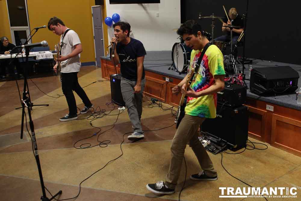 Candid images from the memorial service for Ethan Theriault held on 02/28/2014.