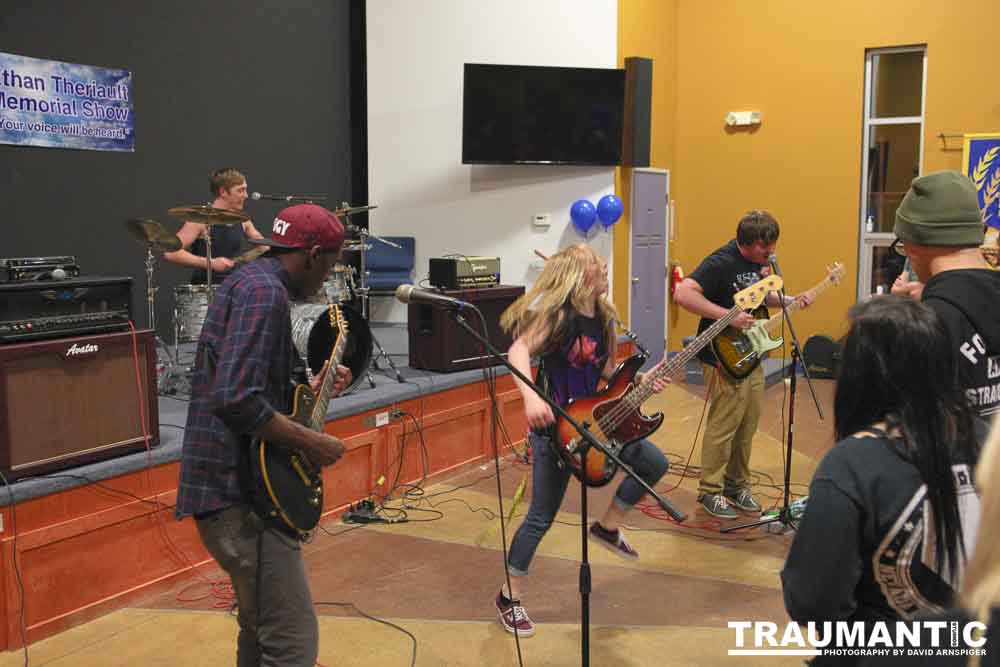 Candid images from the memorial service for Ethan Theriault held on 02/28/2014.