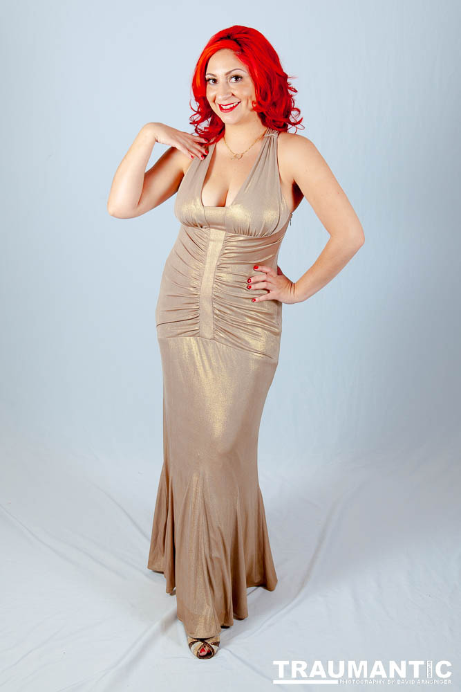 Photograph 7 beautiful women in gorgeous gowns and lingerie?  All right, if I have to.