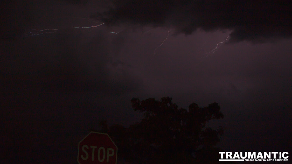 On my way home from an event in Boulder City I drove into a great lighning storm.  I pulled off to the side of the road near my home and set my camera on top of my car and shot a bunch of long exposures.  I did pretty good.  Wish I had my tripod and release, but I made it work.